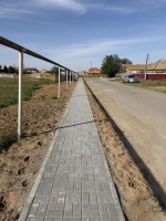 В селе Зензели Лиманского округа на улице Кирова завершаются работы по благоустройству